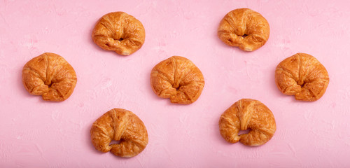 Croissant pattern on the pink background and texture