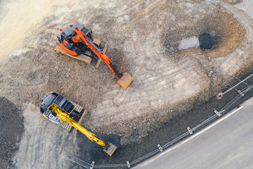 two excavator on an construction site from above