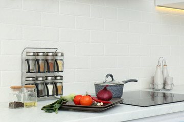 Fresh vegetables on white countertop in kitchen