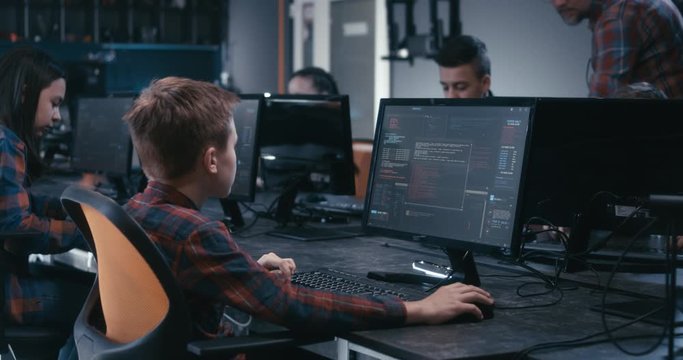 Students learning programming in school