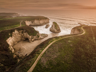 talk a walk with your family or lover or loved ones on a coastal trail during sunrise or sunset