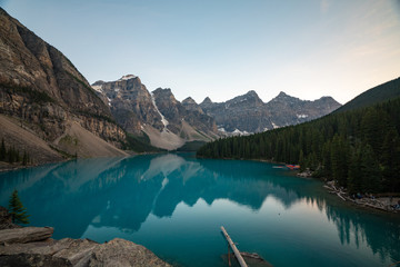 Obraz na płótnie Canvas Image of Moraine Lake with Mountains and Water in Banff National Park during Sunset with reflection in the water