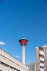 Red Tower in Urban City during clear skies