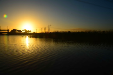 Sun set at the water lake 