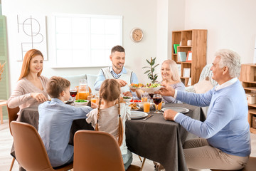 Family celebrating Thanksgiving Day at home