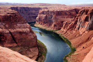 Fototapeta na wymiar Page, Arizona / USA - August 05, 2015: Horseshoe Bend seen from the lookout point, Colorado river, Page, Arizona, USA
