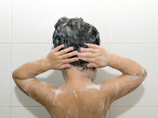 A girl washing her hair.