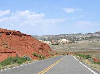 Spectacular red rock platforms along North Fork Highway in Wyoming.
