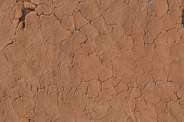 Detail of a cracked clay wall