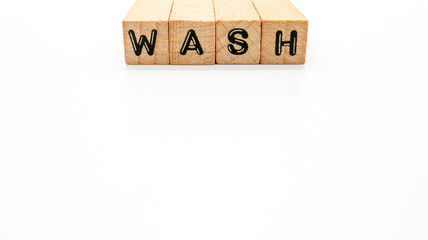 Wooden Text Block of "WASH" on Isolated Background