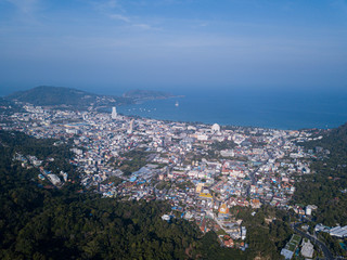Panorama of Patong, Phuket. Aerial view of the sea bay and the city surrounded by mountains