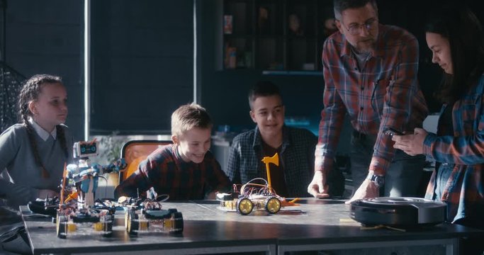 Students learning robotics in class