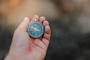 compass in hand isolated on white background