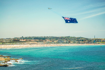 Australia day flag over bondi beach