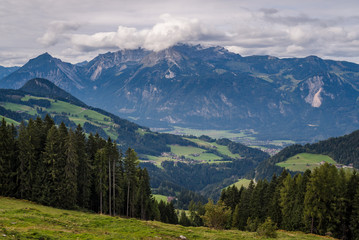 Fototapeta na wymiar Panoramic wide-angle view of a beautiful alpine mountain landscape in the region of Chur, Switzerland