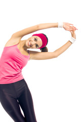 Fototapeta na wymiar Young happy woman in red fitness wear doing fitness exercises, isolated over white background
