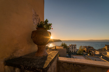  Sunset overlooking the old and historic town of AnguillaraSabazia in Italy