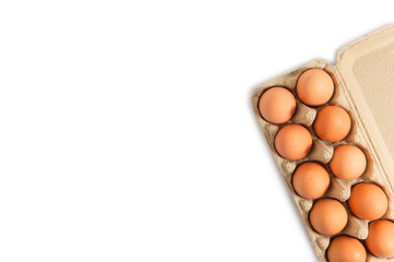 Eggs in a paper tray placed on a white background