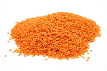 Heap of red lentil isolated for coulinar design