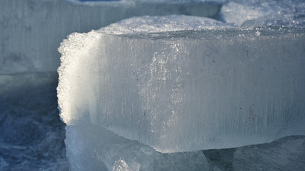  block of broken ice slides closeup