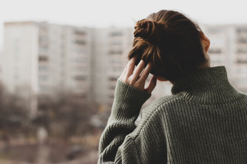 girl on the balcony resting during self-isolation and quarantine