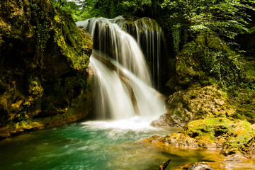 Fototapeta na wymiar La Vaioaga Waterfall, Beusnita National Park, Romania