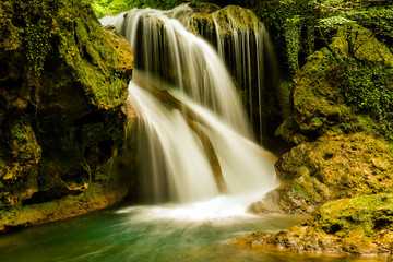 Fototapeta na wymiar La Vaioaga Waterfall, Beusnita National Park, Romania