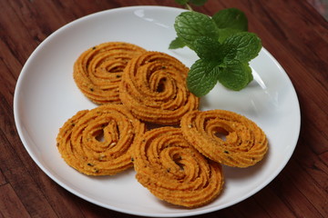 Chakali, murukoo, spiral maharashtrian snack made with gram flour