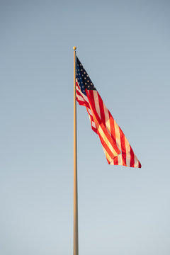 American flag on a tall flagpole.