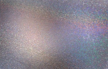 Dark grey shimmer textured surface decorated spectral pattern. Abstract glitter background. 