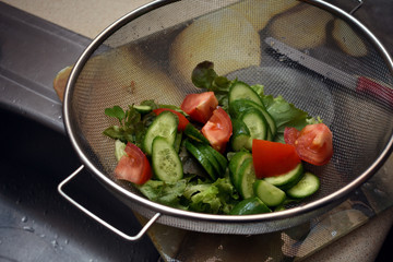 preparing simple salad in kitchen