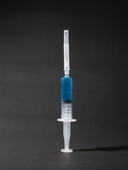 Syringe containing vaccine, ready to treat