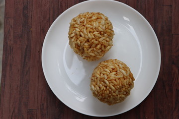 Indian Traditional Puffed Rice Balls is a sweet made using puffed rice mixed with jaggery, Murmura Laddoo, Churmura Laddoo or Pori Urundai