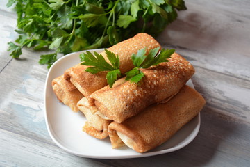 Cabbage rolls stuffed with ground beef and rice in tomato sauce