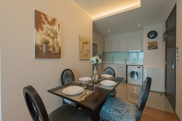 Modern living room and kitchen in small apartment