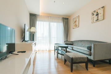 Modern living room and kitchen in small apartment 