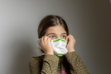 Small girl with mask