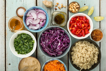 Ingredients for cooking Thai quinoa salad with ginger peanut butter dressing.