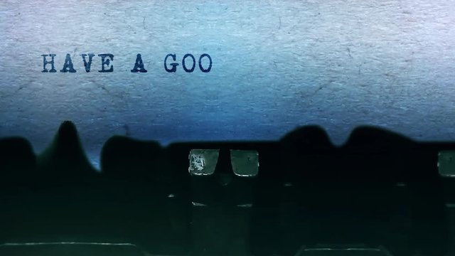 Have a Good Day Word closeup Being Typing and Centered on a Sheet of paper on old vintage Typewriter mechanical 4k Footage Background Animation.