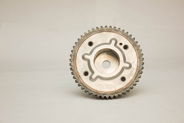 New details on a gray background. The camshaft gears? timing gear