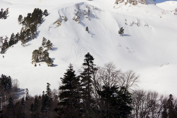 Beautiful mountains covered with snow. Sunny day and blue sky on a frosty day