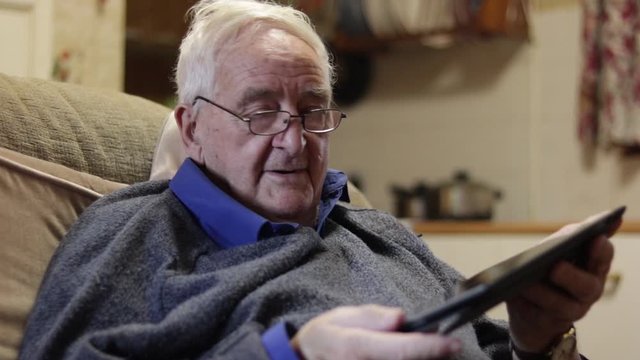 84 Year Old Man Asking How To Use Tablet Computer Confused White Octogenarian