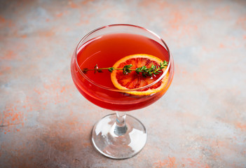 Blood oranges margarita on the rustic background. Selective focus. Shallow depth of field.