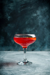 Blood oranges margarita on the rustic background. Selective focus. Shallow depth of field.