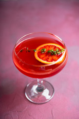 Blood oranges margarita on the rustic background. Selective focus. Shallow depth of field.