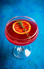 Blood oranges margarita on the rustic background. Selective focus. Shallow depth of field.