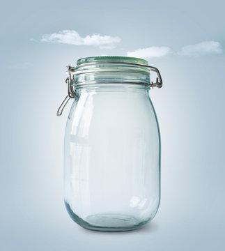 A large empty glass jar with a lid