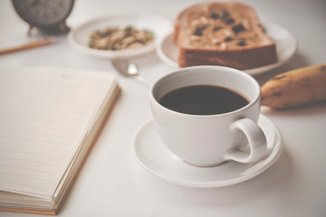 cup of coffee with cookies and cup of coffee
