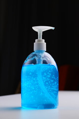 clean alcohol gel medical on black background