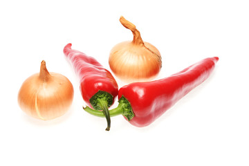 Sweet pepper, onion, tomato and garlic isolated on white background